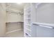 Walk-in closet with built-in shelving and racks providing ample storage space at 1427 Brushback Ave, Henderson, NV 89074
