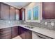 Kitchen featuring stainless steel sink, granite counters, stainless steel appliances and modern backsplash at 1427 Brushback Ave, Henderson, NV 89074