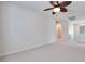 Spacious living area with neutral carpet, fan and an airy atmosphere perfect for relaxation at 1427 Brushback Ave, Henderson, NV 89074