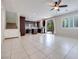 Open-concept space featuring tile floors and sliding glass doors leading to the patio at 1427 Brushback Ave, Henderson, NV 89074