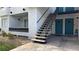 Exterior shows steps to the unit with a green door and black trim at 1455 E Katie Ave # 16, Las Vegas, NV 89119