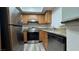 Bright kitchen features stainless steel appliances and light wood cabinets at 1455 E Katie Ave # 16, Las Vegas, NV 89119