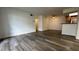 View of the living room showing hardwood floors, ceiling fan, and neutral colored walls at 1455 E Katie Ave # 16, Las Vegas, NV 89119