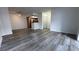 View of the living room with a kitchen bar and hardwood floors at 1455 E Katie Ave # 16, Las Vegas, NV 89119