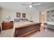 Comfortable bedroom with ceiling fan, carpet, and furniture at 1546 Georgia Ave, Boulder City, NV 89005