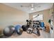 Carpeted exercise room with ceiling fan and exercise equipment at 1546 Georgia Ave, Boulder City, NV 89005