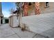 Backyard view features a storage shed and block wall at 1801 S 15Th St, Las Vegas, NV 89104