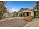 The backyard has gravel and rock beds, landscaping, and a covered patio at 1801 S 15Th St, Las Vegas, NV 89104