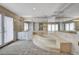 Bright bathroom with white marble, tiled floors, corner bathtub, and double vanity at 1801 S 15Th St, Las Vegas, NV 89104