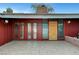 Stylish front entrance with patterned glass doors and adjacent brickwork, providing a unique and welcoming touch at 1801 S 15Th St, Las Vegas, NV 89104
