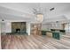 Large open living room featuring a fireplace and a view into the kitchen at 1801 S 15Th St, Las Vegas, NV 89104