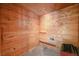 Wood paneled sauna with tiled flooring, seating, and ventilation at 1801 S 15Th St, Las Vegas, NV 89104