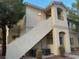 Charming condo with exterior stairs and beautiful desert landscaping in a well-maintained community at 1881 W Alexander Rd # 2055, North Las Vegas, NV 89032