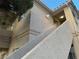 Close-up of condo's exterior staircase leading to upper-level units, showcasing the architecture at 1881 W Alexander Rd # 2055, North Las Vegas, NV 89032