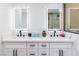 Modern bathroom vanity featuring dual sinks, quartz countertops, and sleek black hardware at 1891 Brian Rd, Pahrump, NV 89048