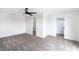 Large bedroom featuring plush carpeting, ceiling fan, and dual closets at 1891 Brian Rd, Pahrump, NV 89048