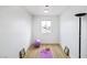 Bright bonus room with natural light, wood floors, yoga mat, and exercise ball at 1891 Brian Rd, Pahrump, NV 89048