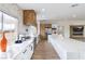 Bright kitchen featuring white cabinets, stainless steel appliances, and a large center island with Quartz countertops at 1891 Brian Rd, Pahrump, NV 89048