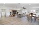 Spacious living room with natural light, modern furniture, and an entertainment center with a large-screen TV at 1891 Brian Rd, Pahrump, NV 89048
