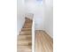 Modern home entry featuring beautiful staircase and wood-style flooring at 1891 Brian Rd, Pahrump, NV 89048