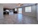 Open living space includes a modern kitchen and dining area with a view of the backyard at 22 Kaku Ridge Way, Las Vegas, NV 89183