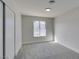 Neutral bedroom with carpet, a window, closet and baseboards at 2205 Mccoig Ave, Las Vegas, NV 89119