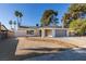 Charming single story home featuring desert landscaping, a two car garage, and neutral colored paint at 2205 Mccoig Ave, Las Vegas, NV 89119