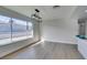 Modern living room and kitchen featuring stainless steel appliances and plenty of natural light at 2205 Mccoig Ave, Las Vegas, NV 89119