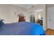 Bedroom with sliding mirrored closet doors and hardwood flooring at 230 E Flamingo Rd # 115, Las Vegas, NV 89169