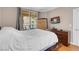 Bright bedroom featuring a sliding glass door leading to a balcony with seating at 230 E Flamingo Rd # 115, Las Vegas, NV 89169