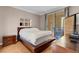 Serene bedroom with a private patio access, and minimalistic decor at 230 E Flamingo Rd # 115, Las Vegas, NV 89169