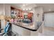 A modern kitchen with granite countertops, stylish cabinets, and stainless appliances at 230 E Flamingo Rd # 115, Las Vegas, NV 89169