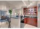 Modern kitchen boasts granite countertops, stainless sink, and abundant cabinet space at 230 E Flamingo Rd # 115, Las Vegas, NV 89169