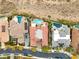 Aerial shot showcasing multiple homes each with pools and unique backyard amenities in a lovely neighborhood at 2660 Mirabella St, Henderson, NV 89052