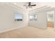 Spacious bedroom with large windows and a connecting bathroom at 2660 Mirabella St, Henderson, NV 89052