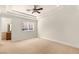 Spacious bedroom with large window and attached bathroom at 2660 Mirabella St, Henderson, NV 89052