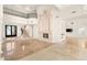 Bright living room featuring high ceilings and a stone fireplace at 2660 Mirabella St, Henderson, NV 89052