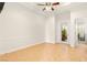 A light and bright living room with wood floor and views to the outside at 2660 Mirabella St, Henderson, NV 89052
