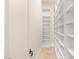 A walk-in closet with open shelving, ideal for organized storage and showcasing wardrobe items at 2660 Mirabella St, Henderson, NV 89052