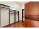 A large walk-in closet with custom built-in shelving and a window at 2660 Mirabella St, Henderson, NV 89052