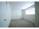 Bright bedroom features neutral carpet, white walls, and a window for natural light at 3467 Garden East Dr, Las Vegas, NV 89121