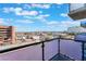 Balcony view showcasing city skyline, blue skies, and surrounding buildings and landscape from upper floor at 353 E Bonneville Ave # 746, Las Vegas, NV 89101