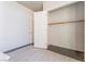 Bedroom closet featuring wood shelf and rod ready for ample storage of clothes and accessories at 353 E Bonneville Ave # 746, Las Vegas, NV 89101
