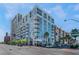 Modern condo building featuring a sleek design and streetscape view from street level at 353 E Bonneville Ave # 746, Las Vegas, NV 89101