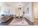 Inviting living area with elegant furnishings, artwork, and access to the dining space at 353 E Bonneville Ave # 746, Las Vegas, NV 89101