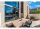 Modern patio with ample seating and outdoor dining, perfect for entertaining at 353 E Bonneville Ave # 746, Las Vegas, NV 89101