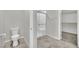 Bathroom featuring a walk-in shower and separate toilet room providing comfort and utility at 389 Scarlet Pine Ct, Henderson, NV 89044