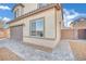 A well-maintained home with a two-car garage and a neatly paved walkway at 389 Scarlet Pine Ct, Henderson, NV 89044