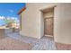 Inviting front entrance with a modern door and neatly paved walkway at 389 Scarlet Pine Ct, Henderson, NV 89044