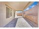 Covered patio featuring pavers and a retaining wall, perfect for outdoor living at 389 Scarlet Pine Ct, Henderson, NV 89044